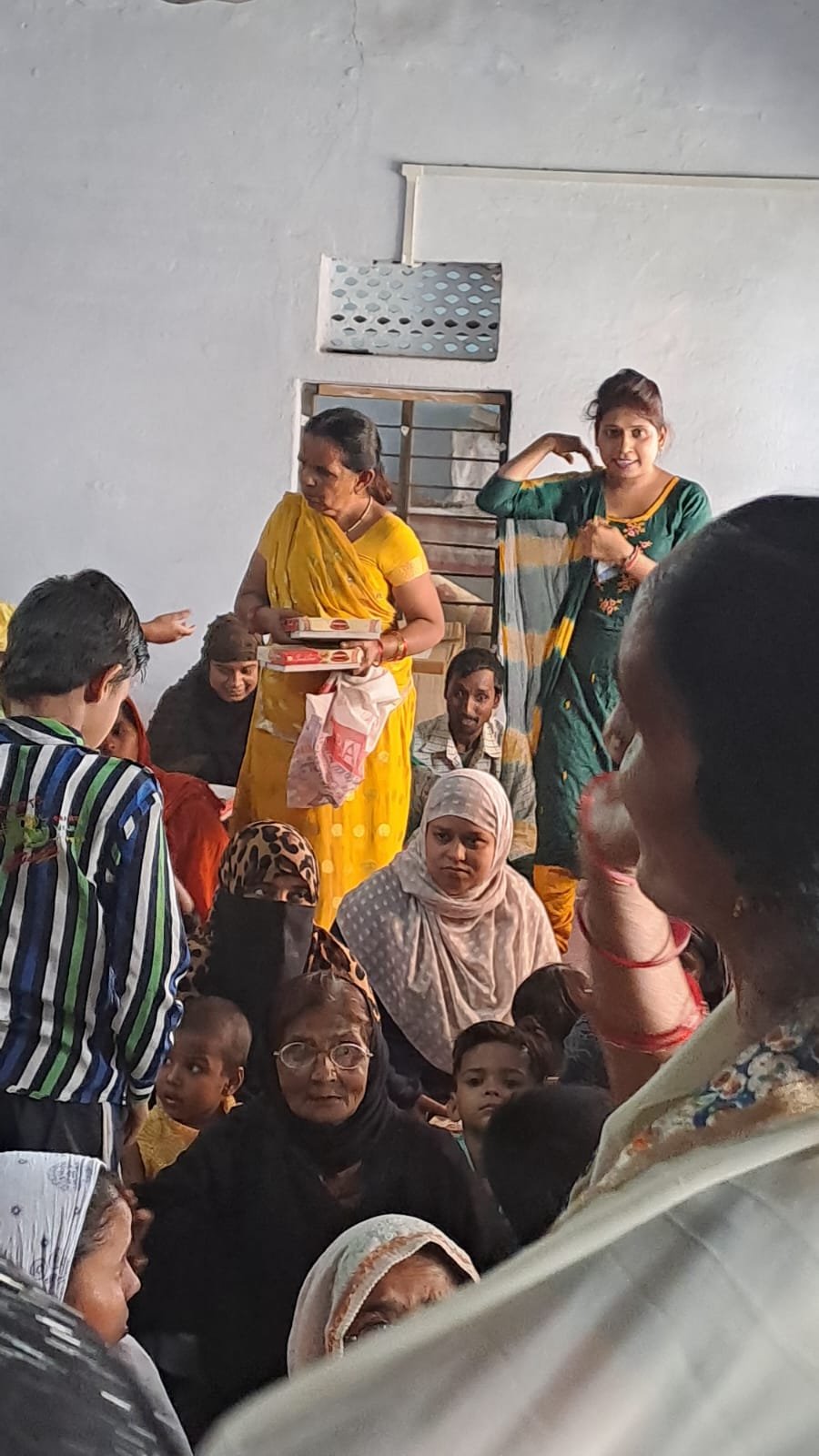 Distribution of new clothes, food and gifts on the occasion of all festivals