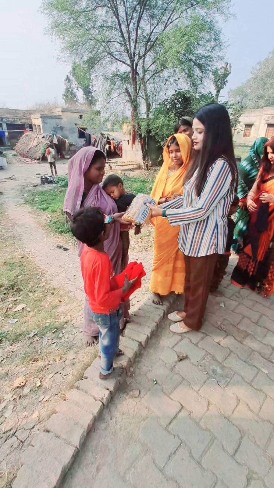 Distribution of new clothes, food and gifts on the occasion of all festivals